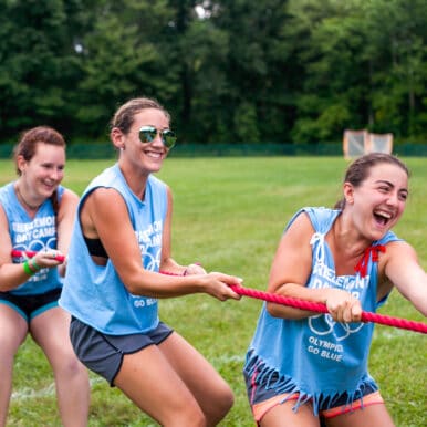 Campers playing tug of war