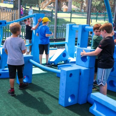 Campers playing in the imagination playground.